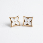 reworked white Louis Vuitton button earrings