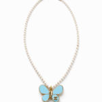 reworked chanel butterfly pendant on a pearl necklace