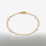 four pearls on a clover gold bracelet