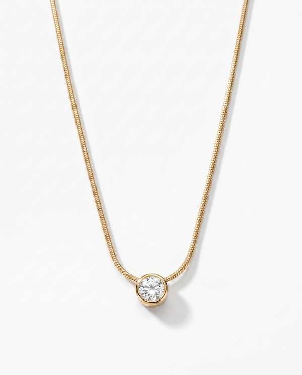 Solitiare cubic zirconia slider on a gold snake chain
